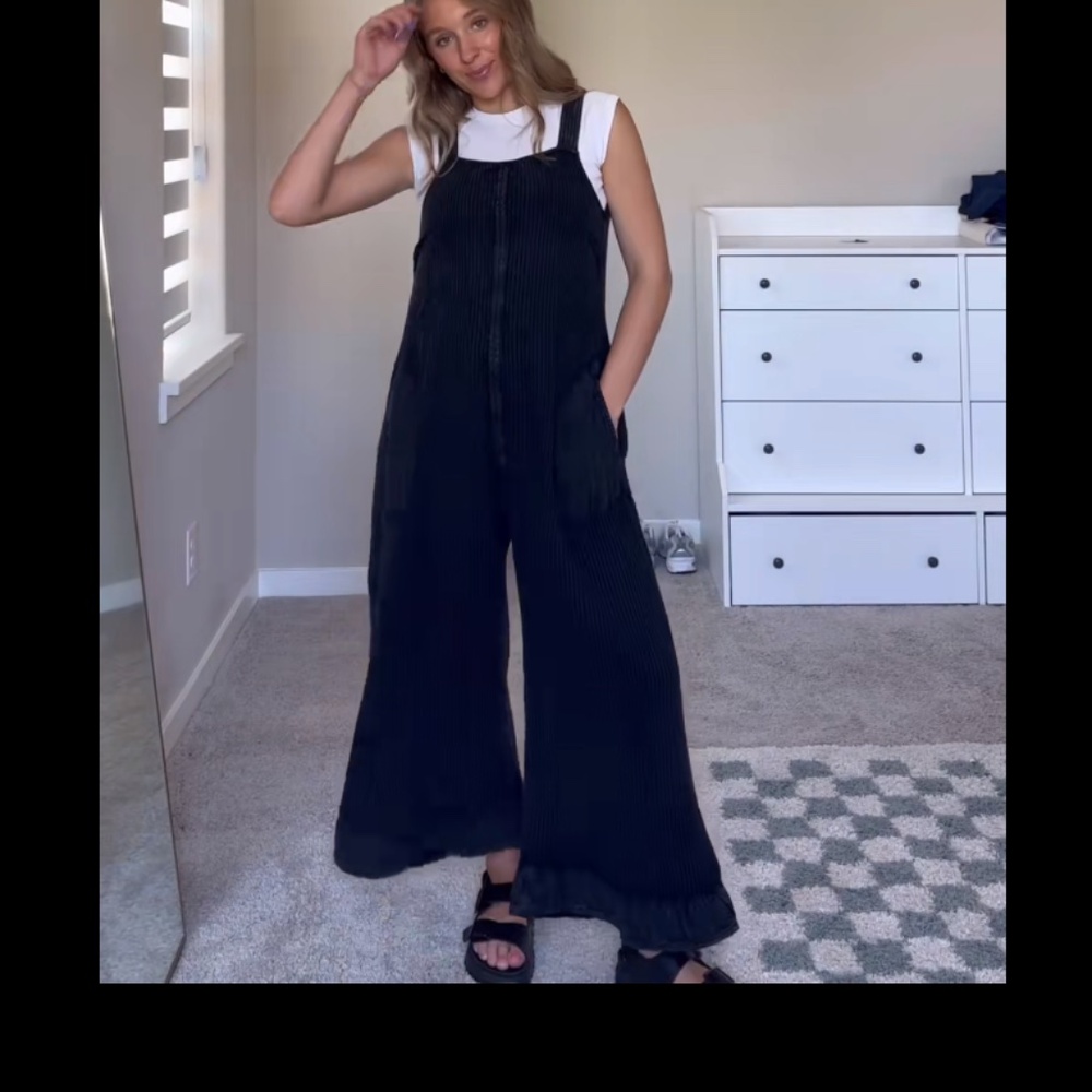 Free people jumpsuit with ruffle ends